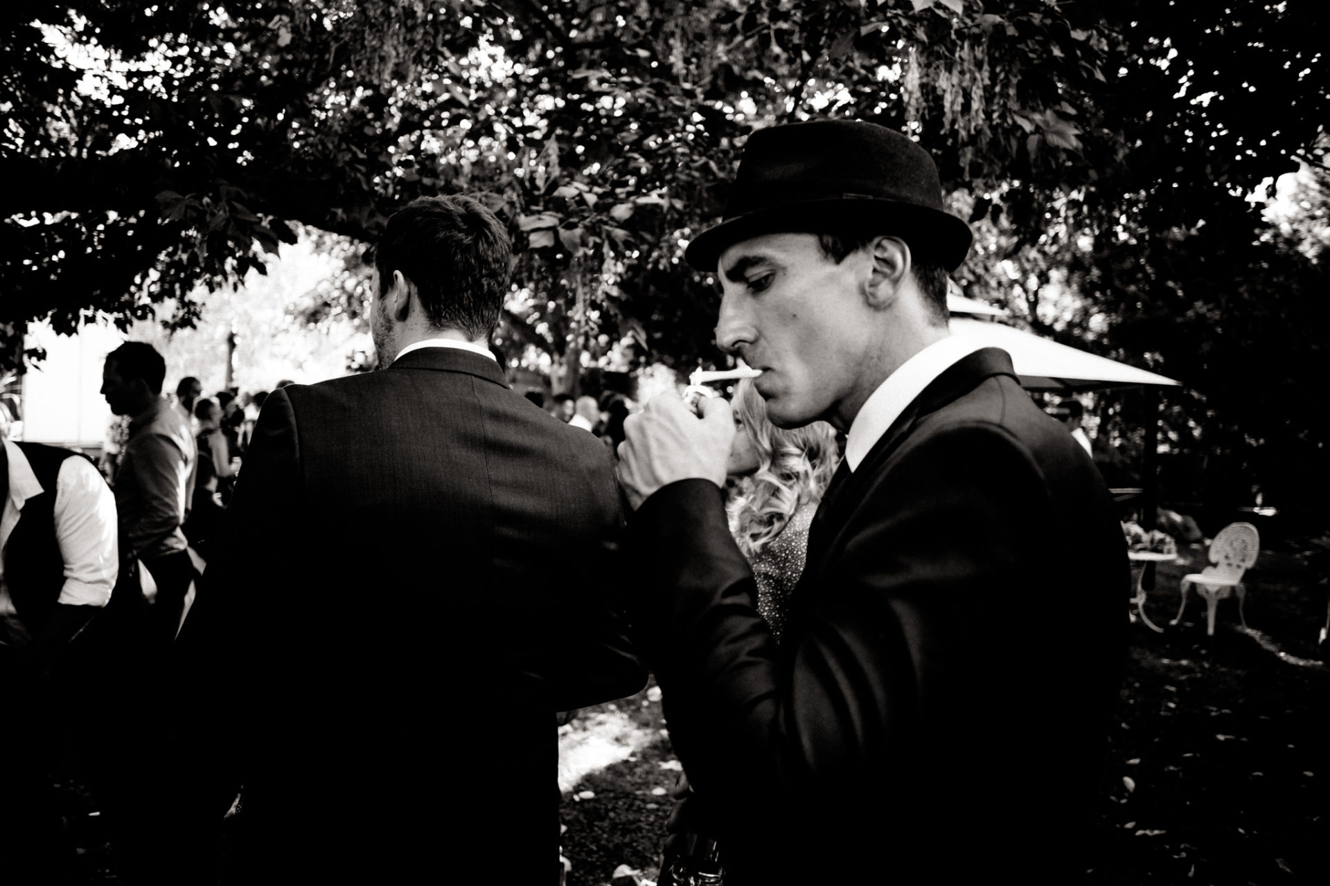 backyard-wedding-australia-melbourne-wedding-guest-smoking-hat-cool-look